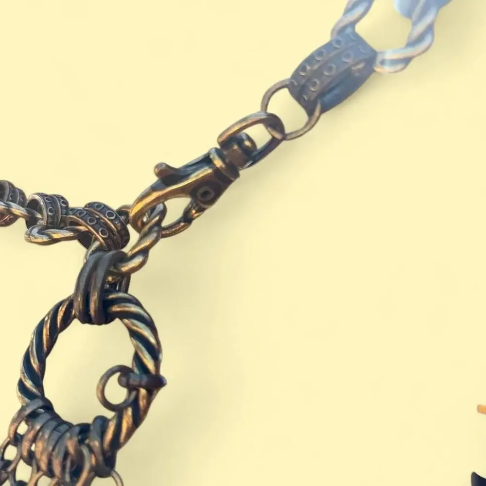 Vintage chunky antique bronze tassel
